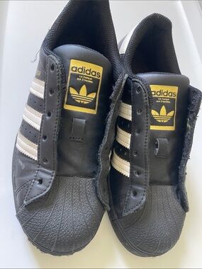 adidas Black and White Superstar Sneakers with Gold Logo
